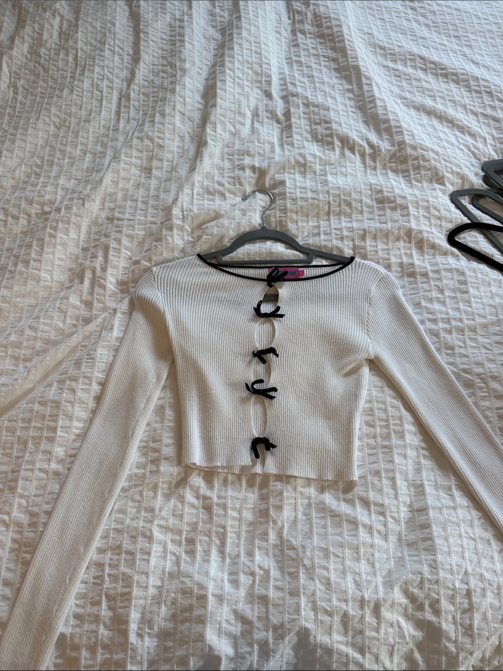 Edikted White Ribbed Long-Sleeve Cropped Top with Black Trim and Bows
